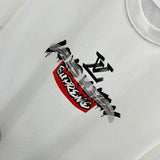 Flat lay presentation of Louis Vuitton cotton t-shirt with monogram-inspired silhouette