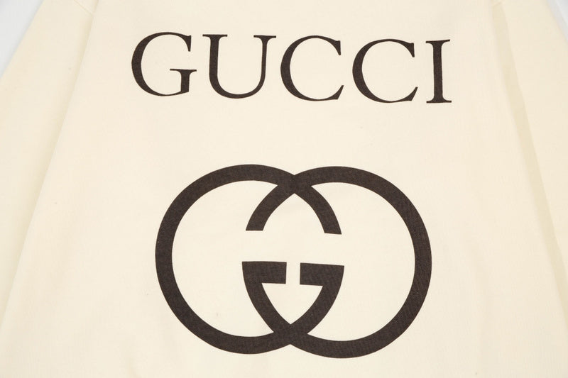 Flat lay presentation of Gucci luxury clothing with everyday silhouette