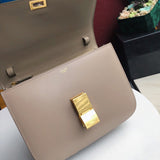 Handle and strap detail of modern structured women's handbag – women's luxury handbag