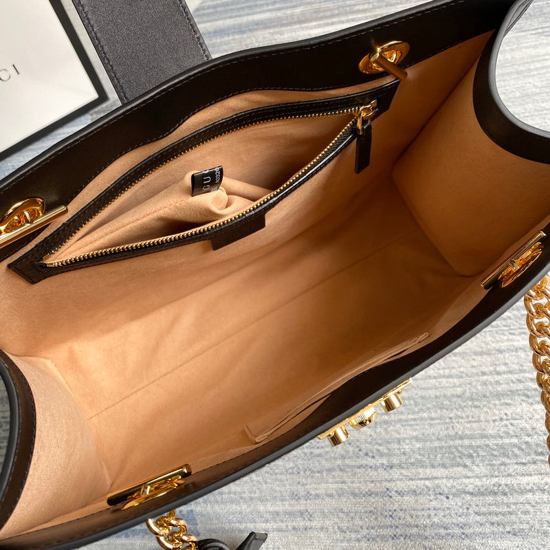 Side profile of elevated refined women's handbag – women's statement bag