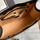Side profile of elevated refined women's handbag – women's statement bag
