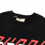 Close-up detail shot of Gucci luxury clothing with relaxed-fit cut