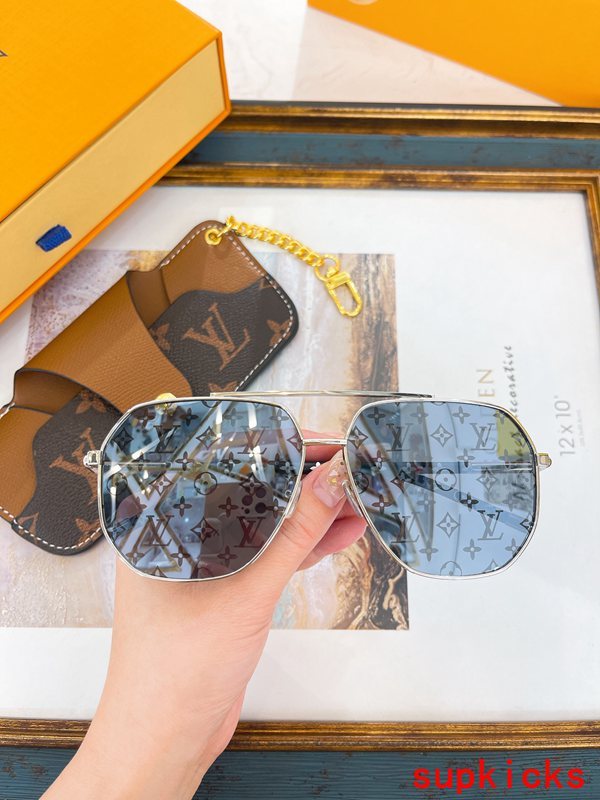 Close-up detail view of Louis Vuitton unisex sunglasses