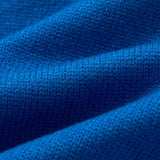 Close-up detail shot of Gucci luxury clothing with logo-detail design