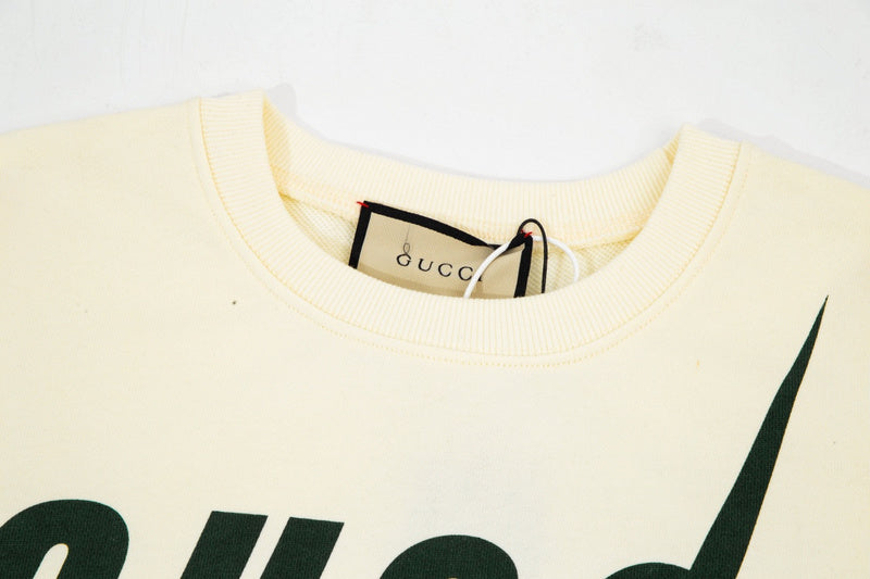 Close-up detail shot of Gucci luxury clothing with relaxed-fit cut