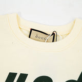 Close-up detail shot of Gucci luxury clothing with relaxed-fit cut