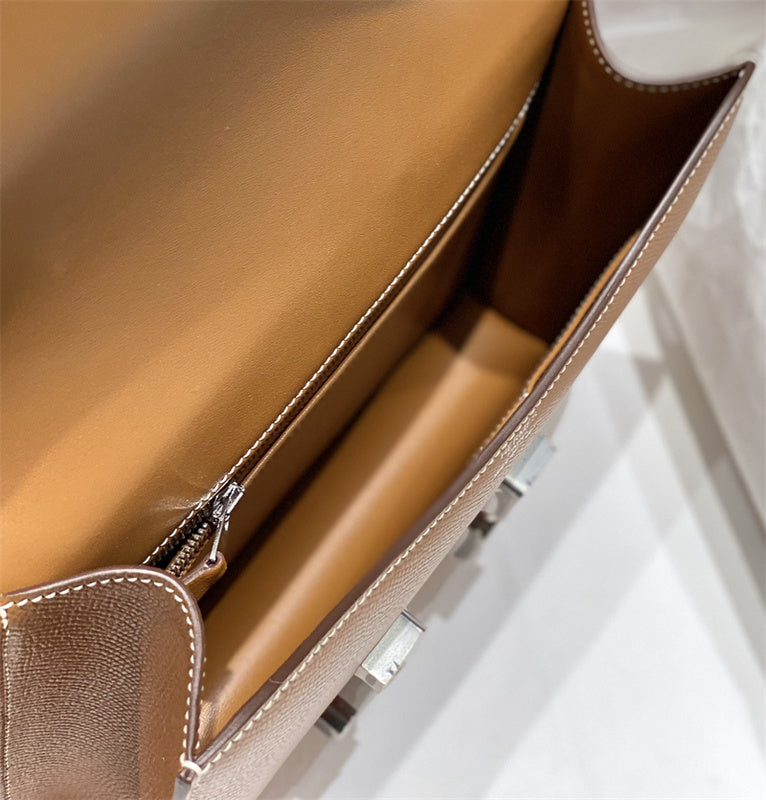 Side view of streamlined structured handbag