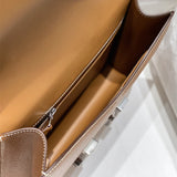 Side view of streamlined structured handbag