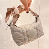 Close-up detail of elevated refined women's handbag – women's luxury handbag
