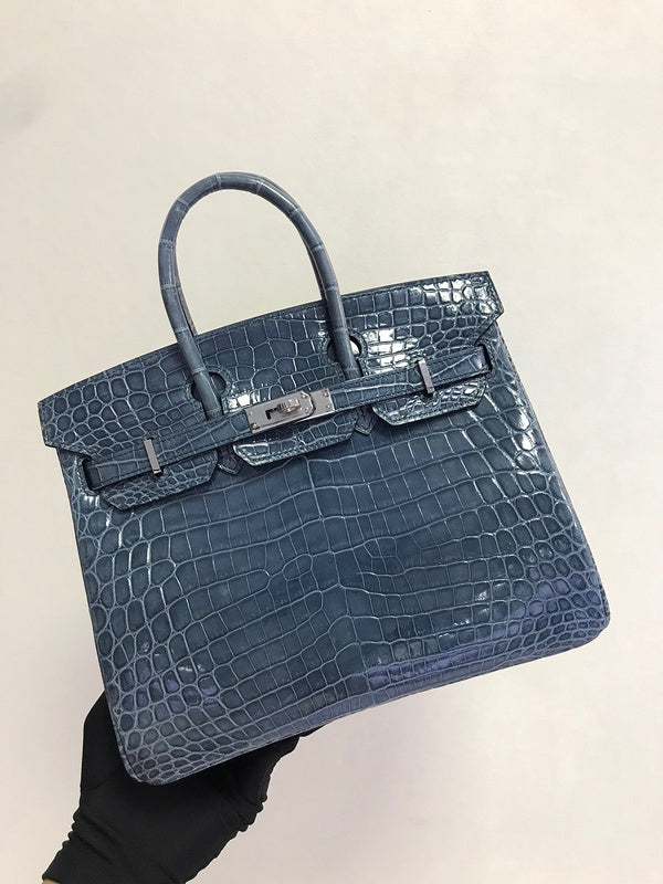 Side view of structured structured handbag
