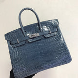 Side view of structured structured handbag
