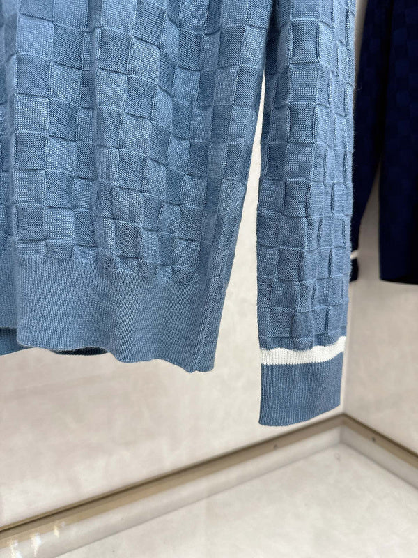 Back view of Louis Vuitton luxury clothing with signature branding