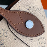 Close-up detail of structured sleek women's handbag – women's statement bag