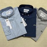 Side profile of Lacoste luxury clothing with logo-detail design