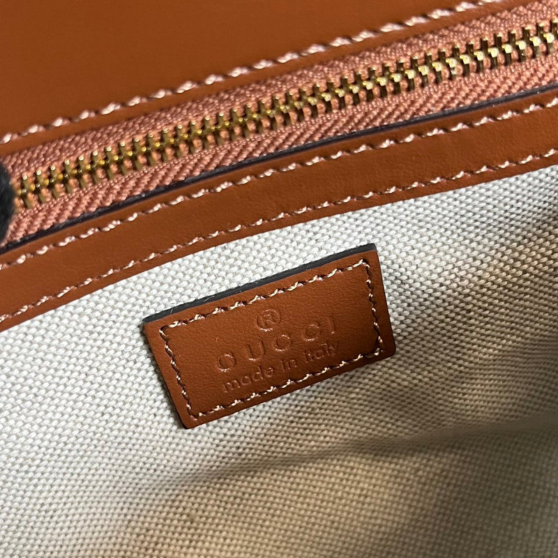 Side profile of premium statement women's handbag – women's premium purse
