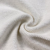 Side profile of Gucci luxury clothing with signature branding