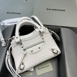 Chic Faux Leather Handbag - Premium Craftsmanship Detailing | Women's Premium Handbag #316 - front view (image 1) of designer-inspired handbag