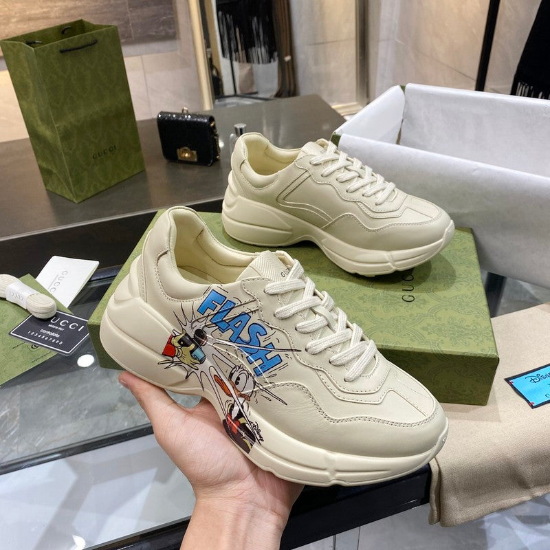 Side profile of Gucci clean off-white sneakers bold athletic profile