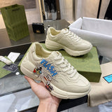 Side profile of Gucci clean off-white sneakers bold athletic profile
