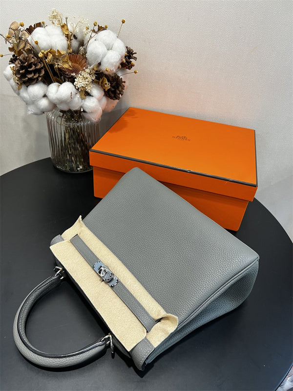  Tailored structured bag carried on shoulder 10
