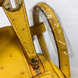 Side view of curated structured handbag