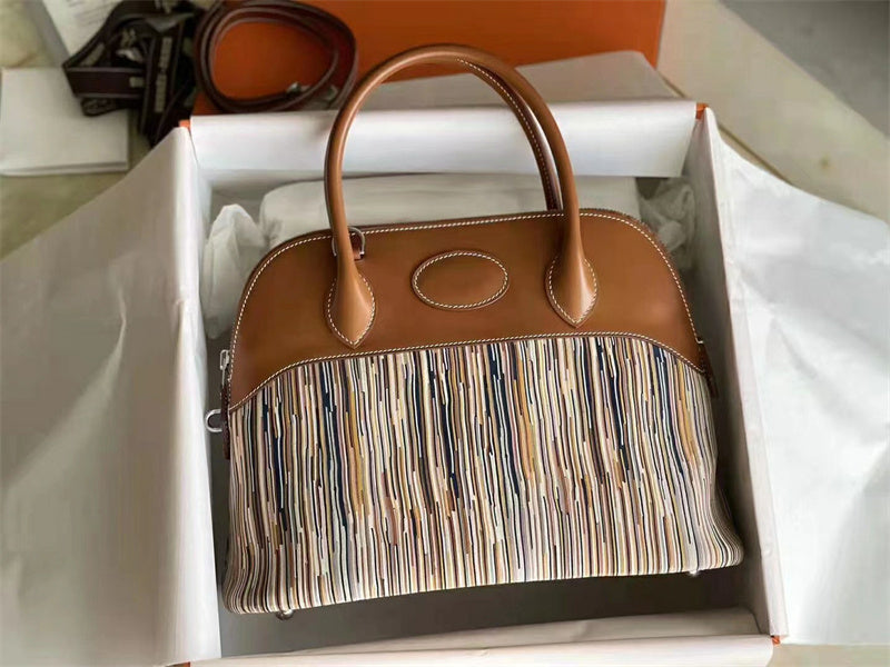 Side view of fluid structured handbag