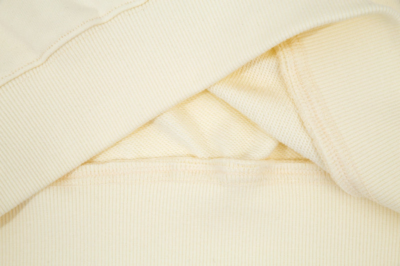 Side profile of Gucci luxury clothing with everyday silhouette