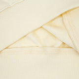 Side profile of Gucci luxury clothing with everyday silhouette