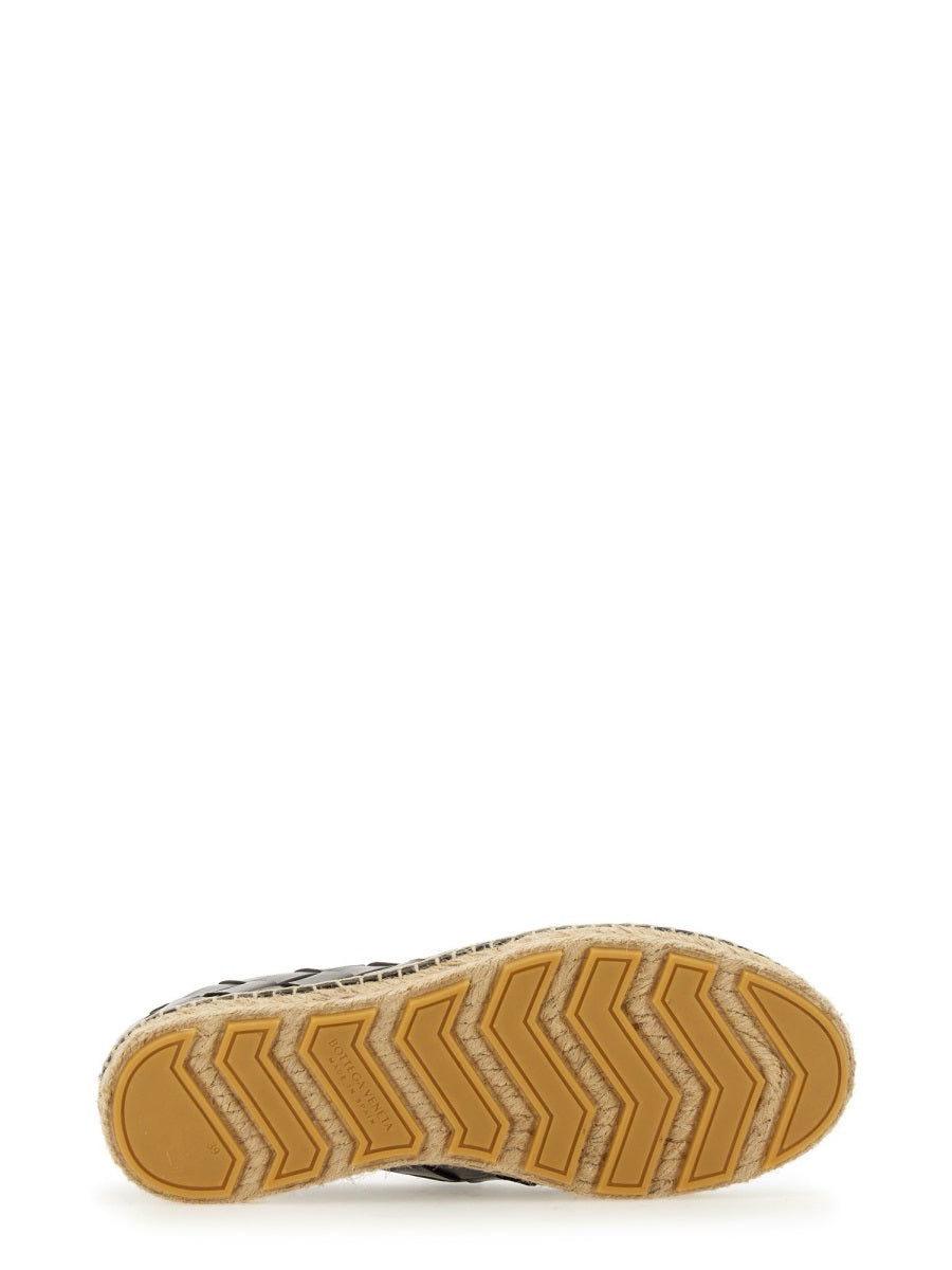 Bottega Veneta flats lifestyle shot premium designer piece
