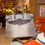 Side view of clean-lined structured handbag