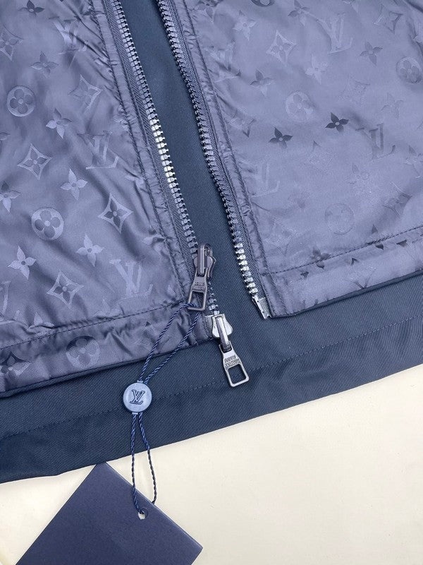 Flat lay presentation of Louis Vuitton luxury clothing with tailored silhouette