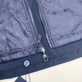 Flat lay presentation of Louis Vuitton luxury clothing with tailored silhouette