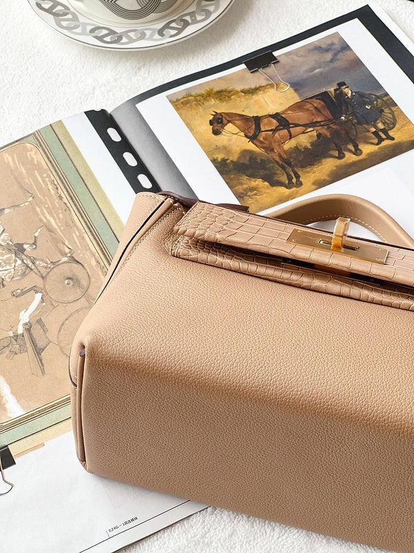  statement top-handle bag styled with outfit