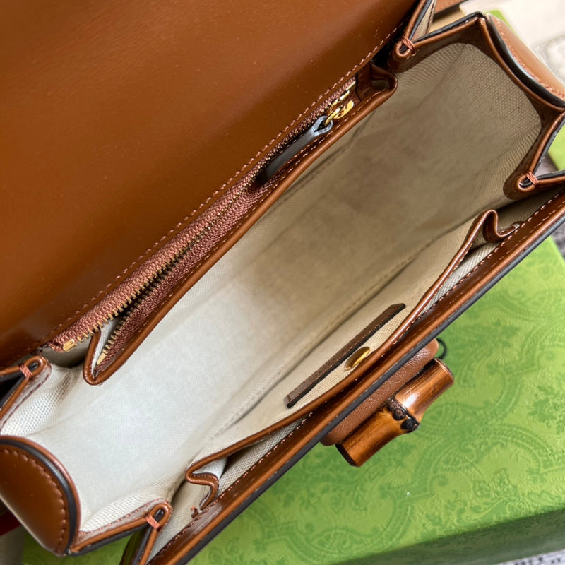 Top view of polished sleek women's handbag – women's statement bag