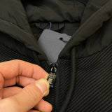Back view of Louis Vuitton luxury clothing with label-forward styling