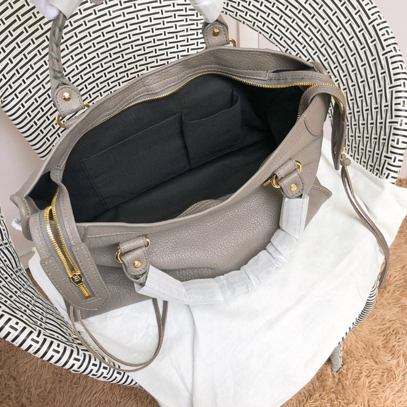 Close-up detail of structured statement women's handbag – women's designer-style accessory