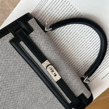  Understated crossbody bag front view 13