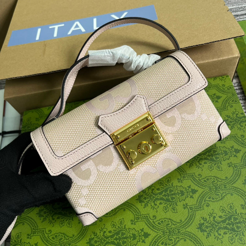 Handle and strap detail of statement everyday-luxe women's handbag – women's premium purse