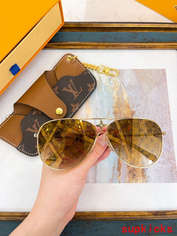 Angled view of Louis Vuitton unisex sunglasses