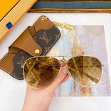 Angled view of Louis Vuitton unisex sunglasses