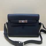 Side view of clean-lined structured handbag