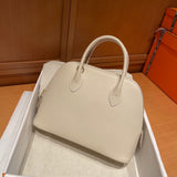 Close-up detail of statement bag design