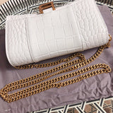 Top view of chic polished women's handbag – women's statement bag