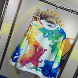 Side profile of Louis Vuitton luxury clothing with signature branding