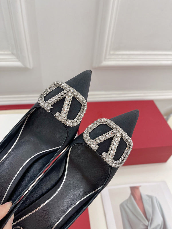 Texture and finish detail of Valentino Garavani luxury piece style No.220