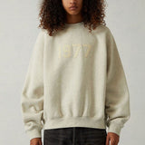 Front view of Fear of God Essentials Essentials Sweatshirt premium sweatshirt