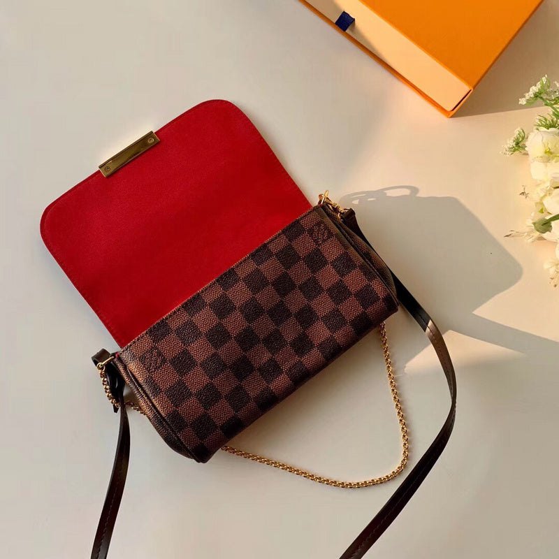 Handle and strap detail of modern polished women's handbag – women's luxury handbag
