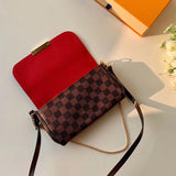 Handle and strap detail of modern polished women's handbag – women's luxury handbag
