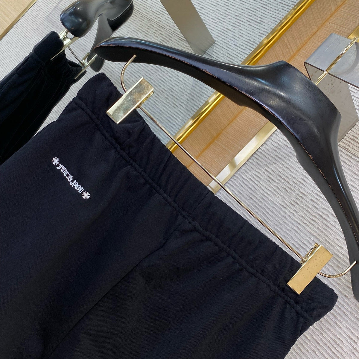 Chrome Hearts Shorts flat lay on neutral background