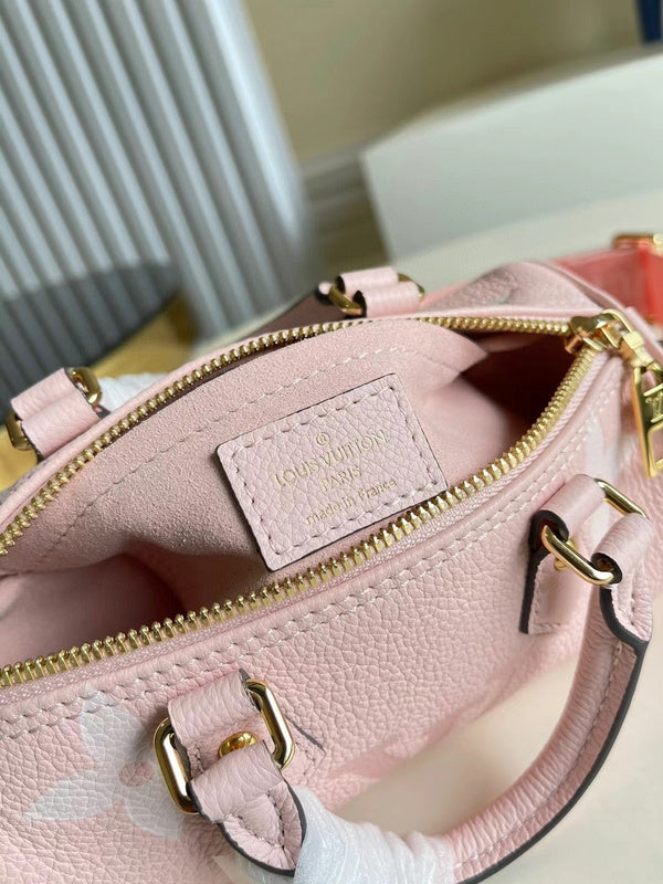Front view of polished sleek women's handbag – women's statement bag
